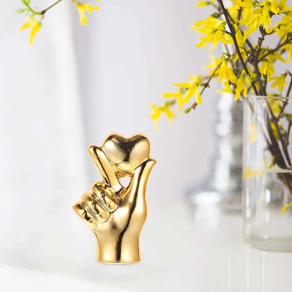 

Small Gold Ceramic Heart Hand Gesture Sculpture Romantic Love Statue Elegant Home Decor Office Shelf Coffee Table Display