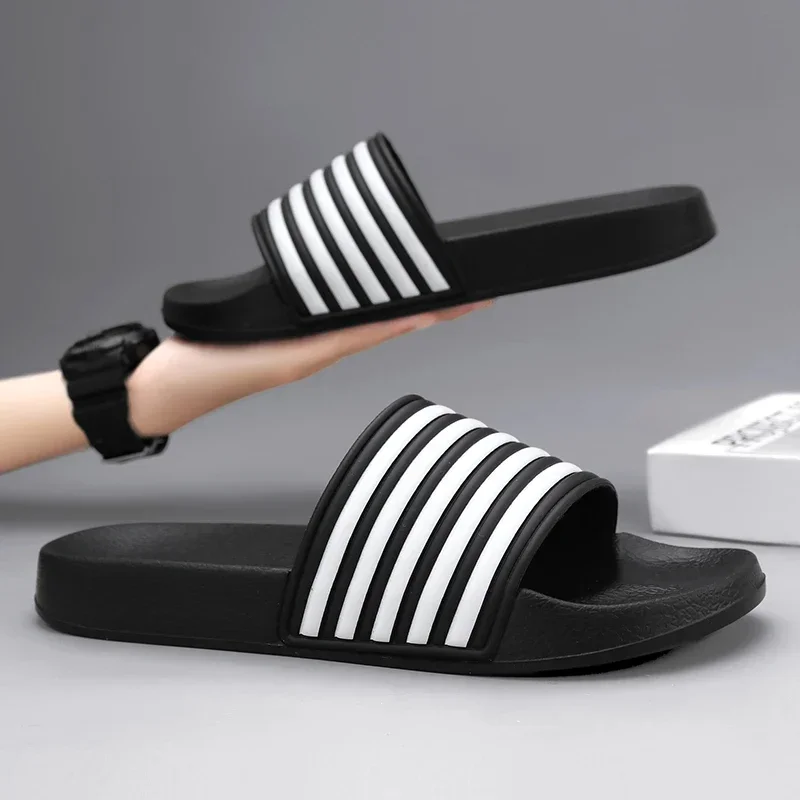 

Classic Fashion Couple Simple Black and White Stripes Matching Color Flat Super Light Summer Non-slip Quick Dry Slippers