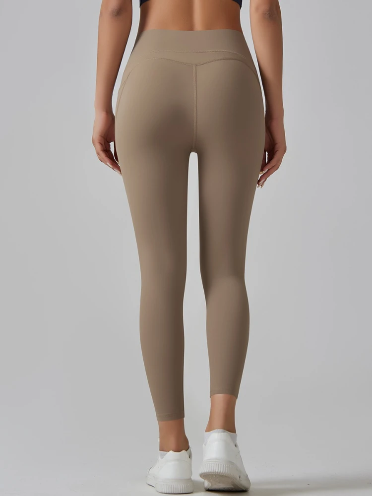 여성 의류 요가 레깅스 스포츠웨어 패션 캐주얼 솔리드 컬러 타이트 바지 여성용 포켓 달리기 피트니스 짐 롱 팬츠