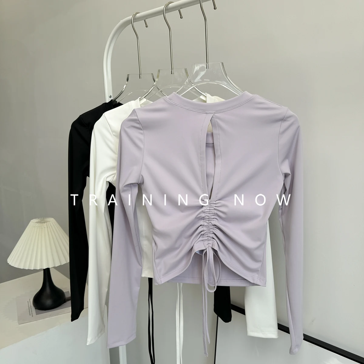 

Fashionable slim yoga suit long sleeves for women with hollow drawstring beautiful back running quick-drying top with chest pad