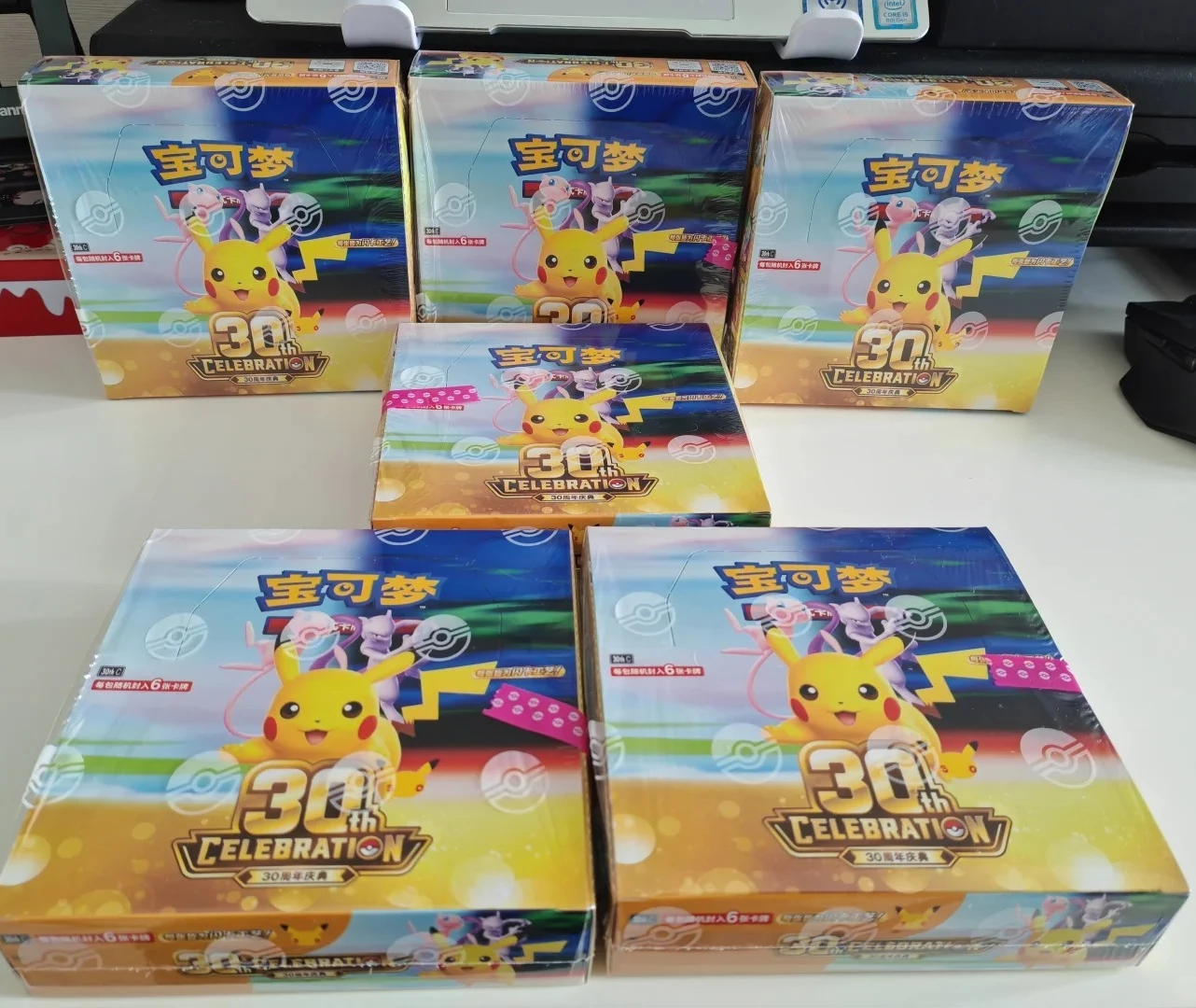 2026 New Pokemon Simplified Chinese 30th Anniversary Pikachu Charizard Collectible Cards Figure Booster Pack Gift Set in Stock