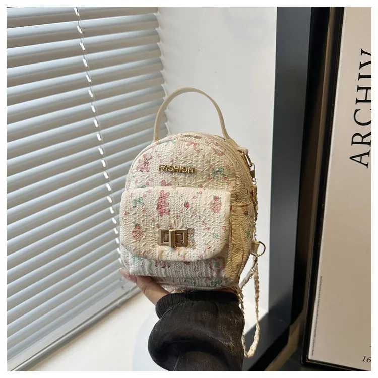 

2025 Новый рюкзак с мультяшным медведем - милая школьная сумка с принтом каракулей для женщин, легкая студенческая сумка, стильный повседневный рюкзак