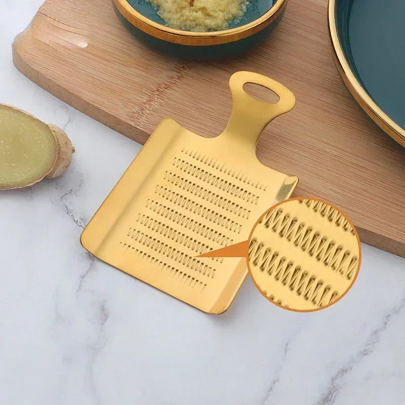 أداة مطبخ من الفولاذ المقاوم للصدأ لطحن الزنجبيل والثوم والوسابي والفواكه والخضروات، قطعة واحدة من أداة كسارة المبشرة