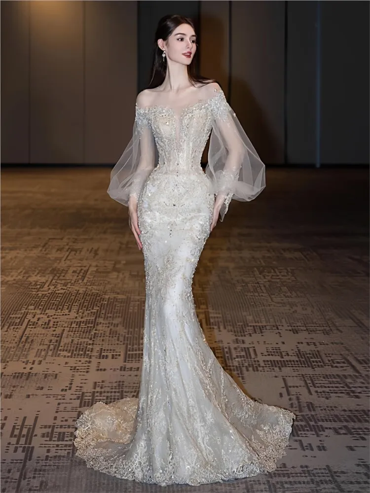 

A new fish-tail light luxury heavy industry toasting welcoming and leaving dress with chiffon feel