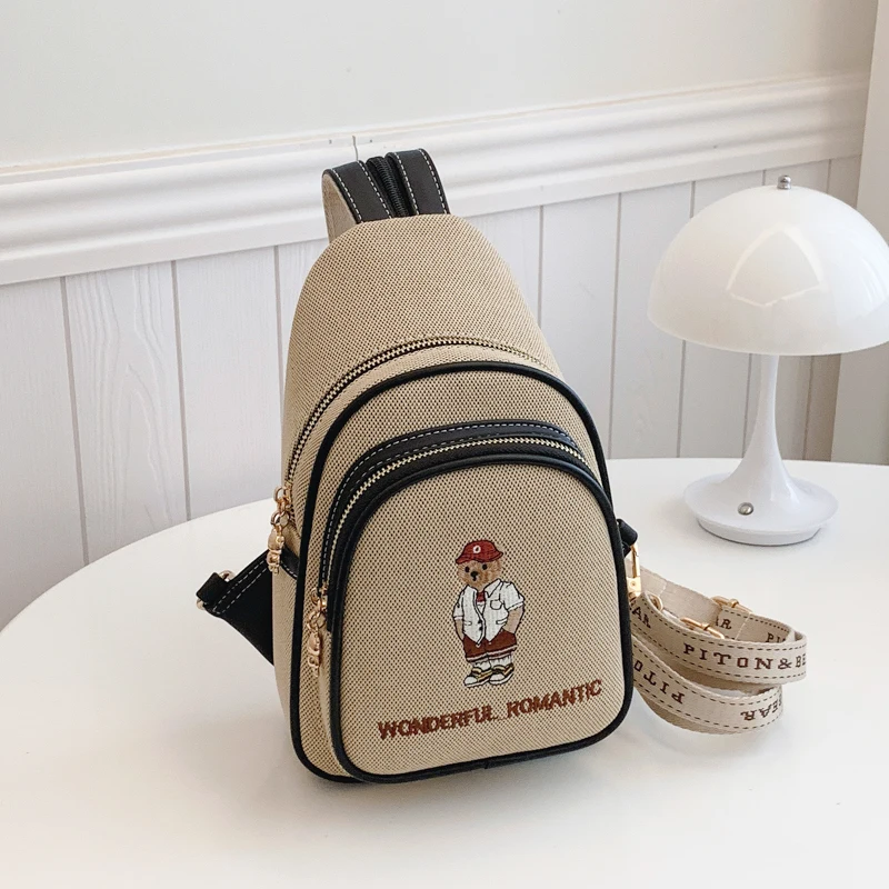 カジュアル刺繍キャンバスクロスボディバッグ女性用シングルショルダースリングバッグストリートトレンドベアーデザインファッショナブルな多用途チェストバッグ