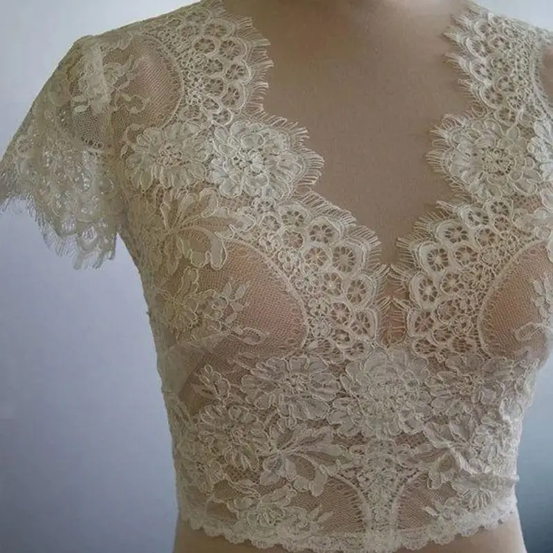 

Cheap Bridal Wraps Modest Alencon Lace Crystals V Neck Sheath Bride Bolero For Weddings Short Sleeves Lace Bridal Jacket
