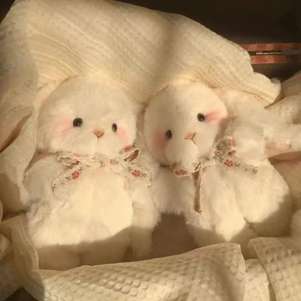 

Ручная наполненная плюшевая игрушка с виловыми ушками кролика с поясом на животе и бантом, плюшевая кукла с вилоухим кроликом, мультяшная имитация плюшевой куклы-животное