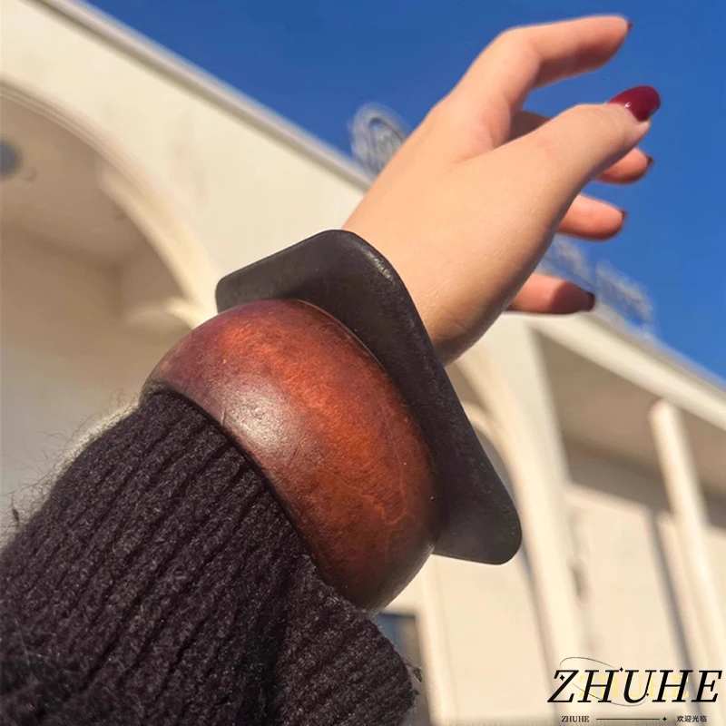 

The Multi-layer Stacked Geometric Light Luxury Wooden Bracelet With A Retro Style Is A Jewelry Accessory For Women