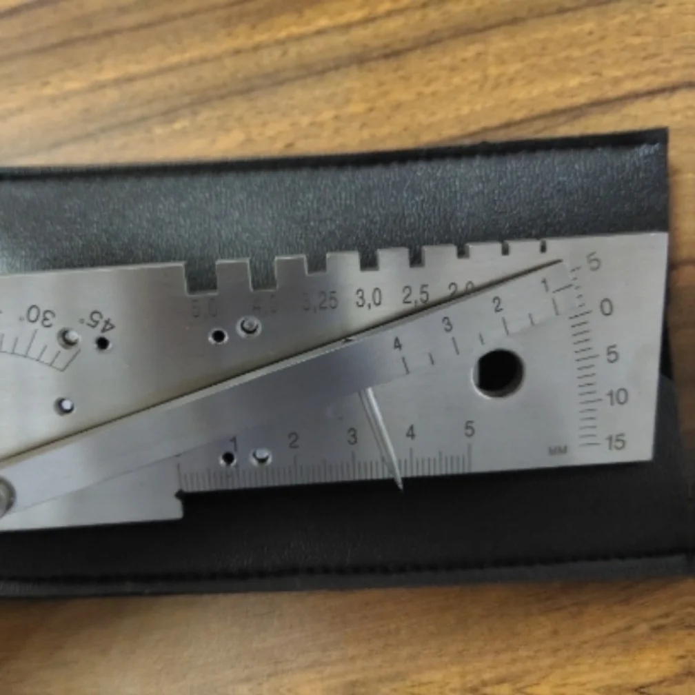 

Multi purpose welding gauge for measuring pipe weld seam thickness bevel angle gap width electrode diameter and joint defects