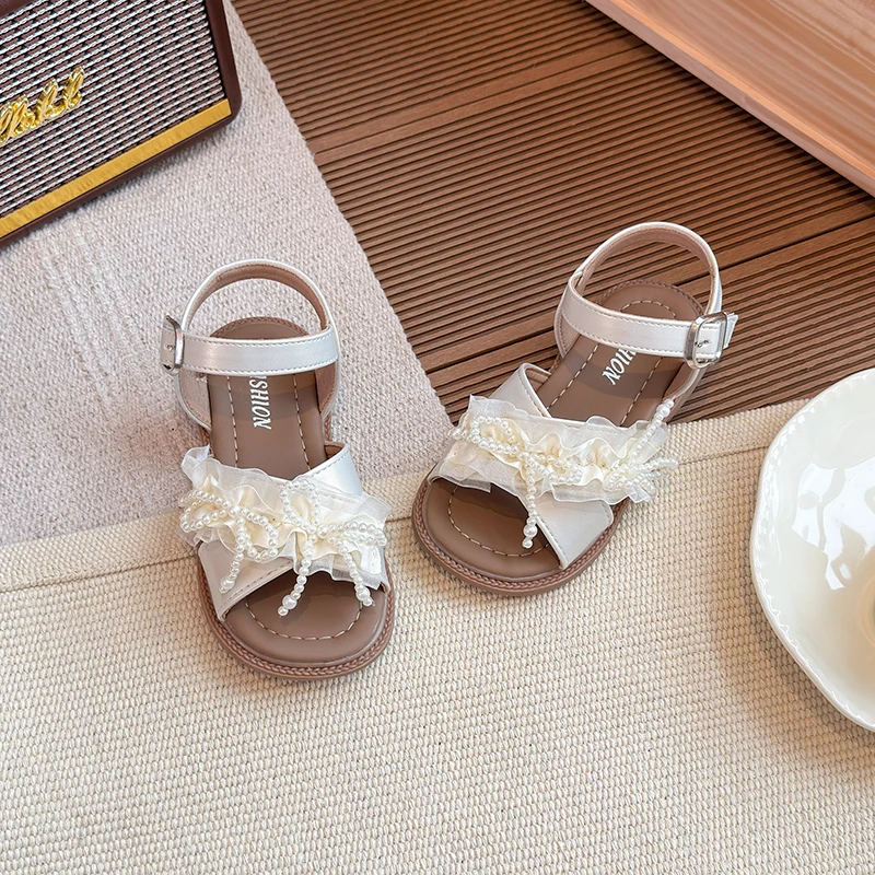 

Girls Summer Beach Shoes Kids Casual Sandals Soft Sole Fashion Student Children Wearing Versatile Princess Shoes 2025 Summer New