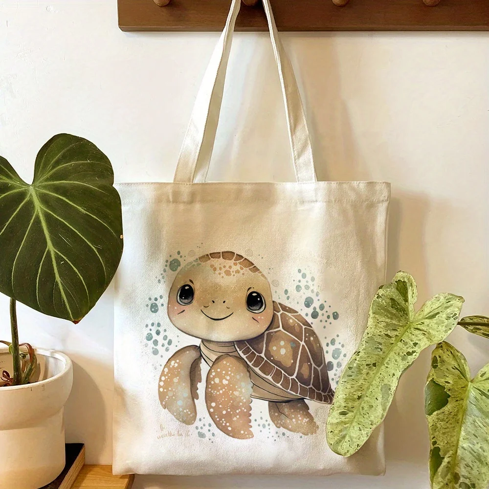 A Cute sea turtle pattern print canvas tote bag, suitable for daily use, shopping, school, and travel