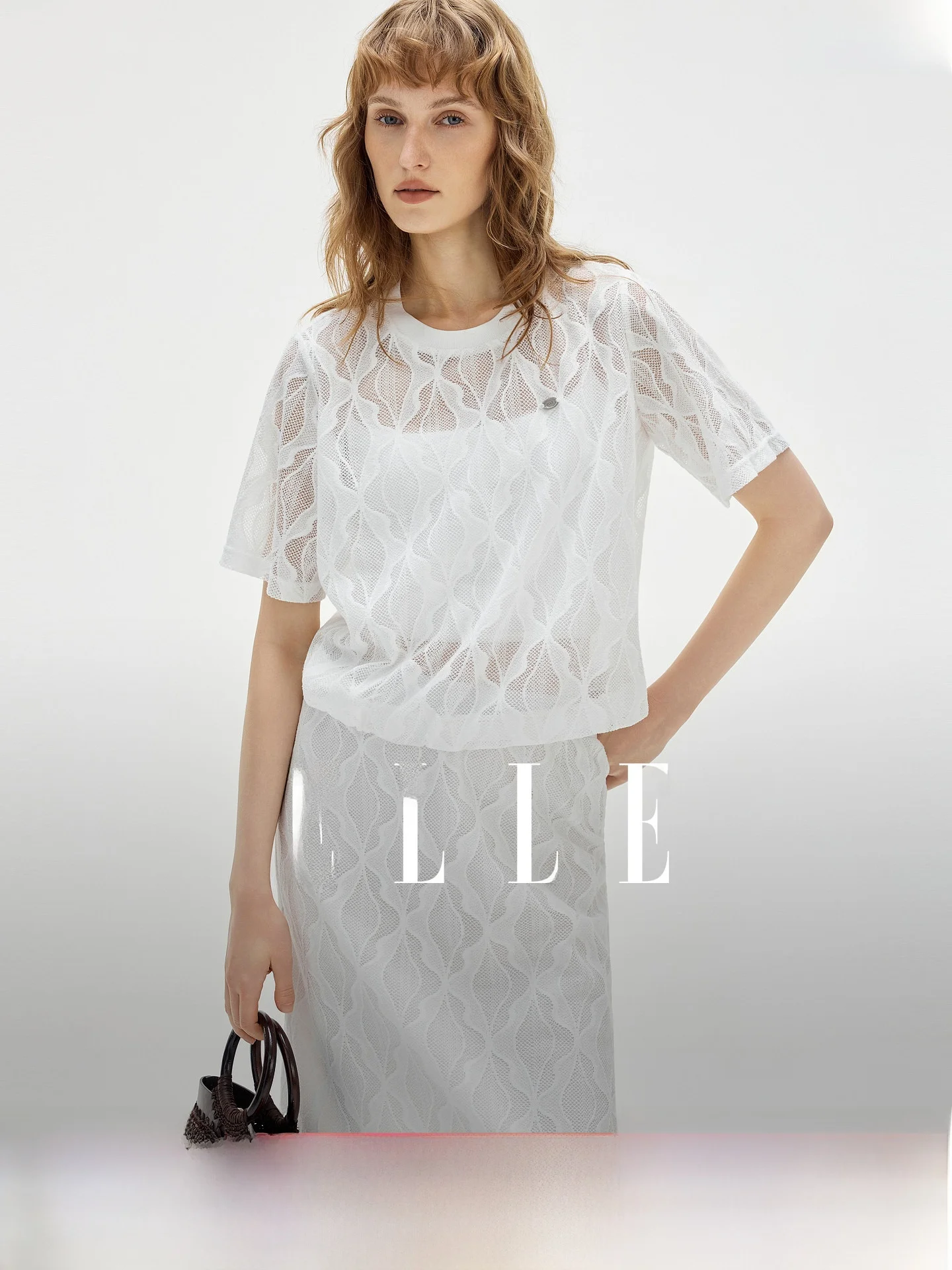 

Elle Design Hollow out Short Sleeve Half Length Skirt Set Women's Fashionable Casual Two Piece Set Summer New Arrival