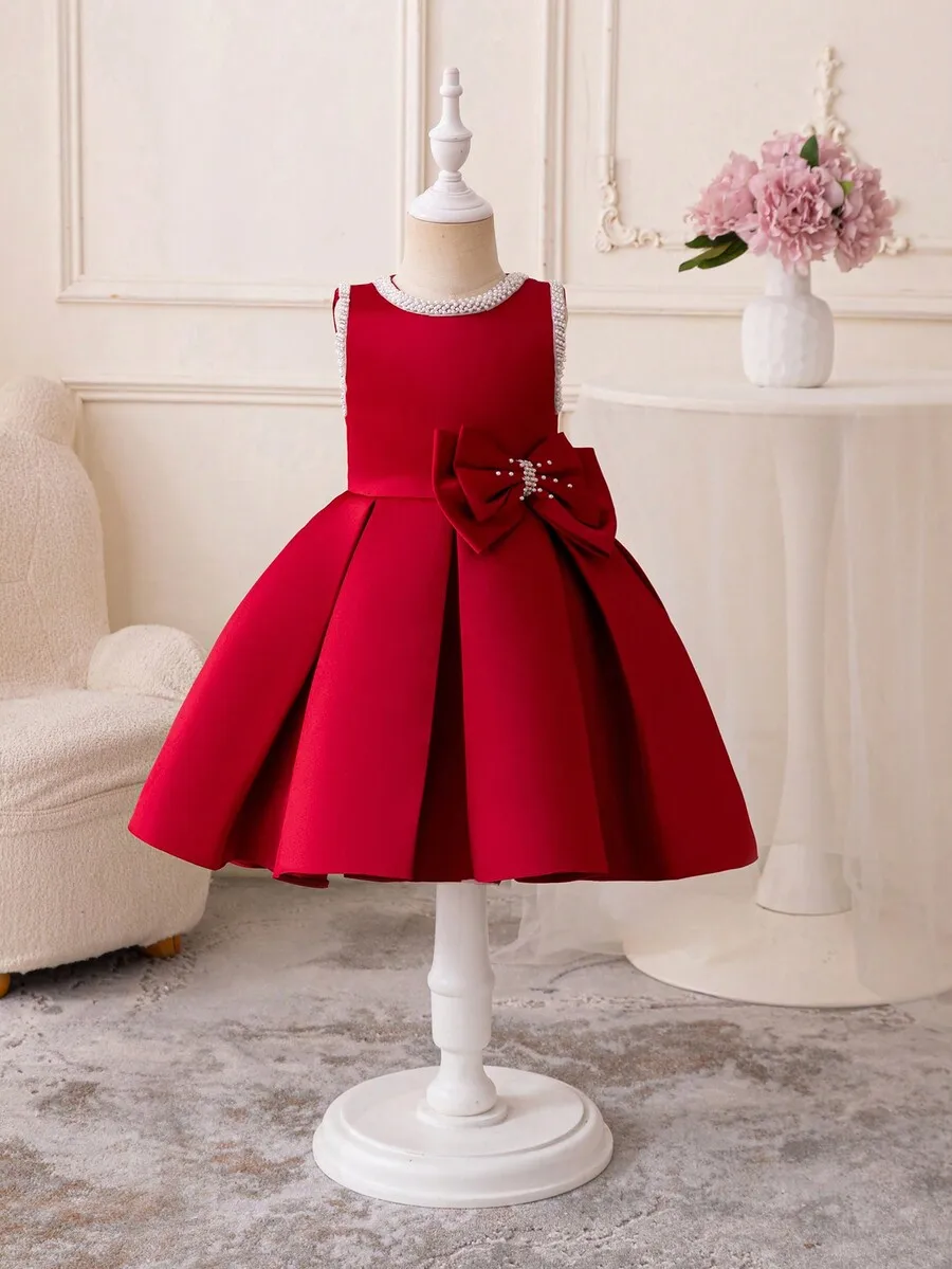 

Red Sleeveless A-Line Evening Dress With Pearl Trim And Bow Decoration