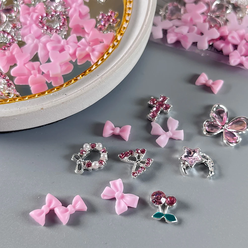 50pcs Mixed Bowknot Nail Art Charms 3D Luxurious Pink Butterfly Rhinestone Heart-Alloy Diamond/Crystal Crown/cross Nail Decor