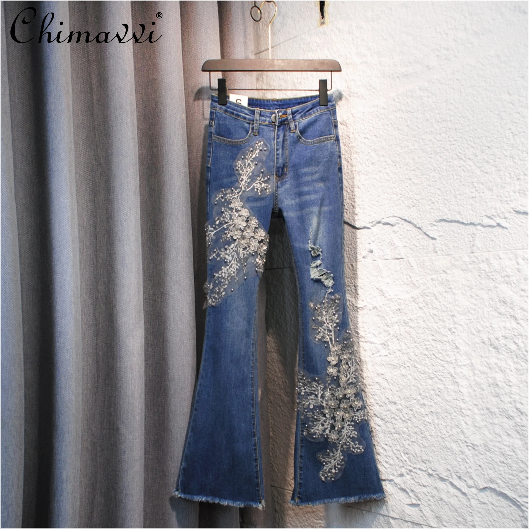 

2025 Spring and Summer New European Heavy Embroidery Beads High Waist Jeans Fashion Slim-fit Micro Horn Denim Trousers Women