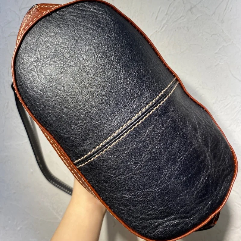 High quality women's bag new simple solid color first layer leather multifunctional small bucket shoulder bag crossbody bag