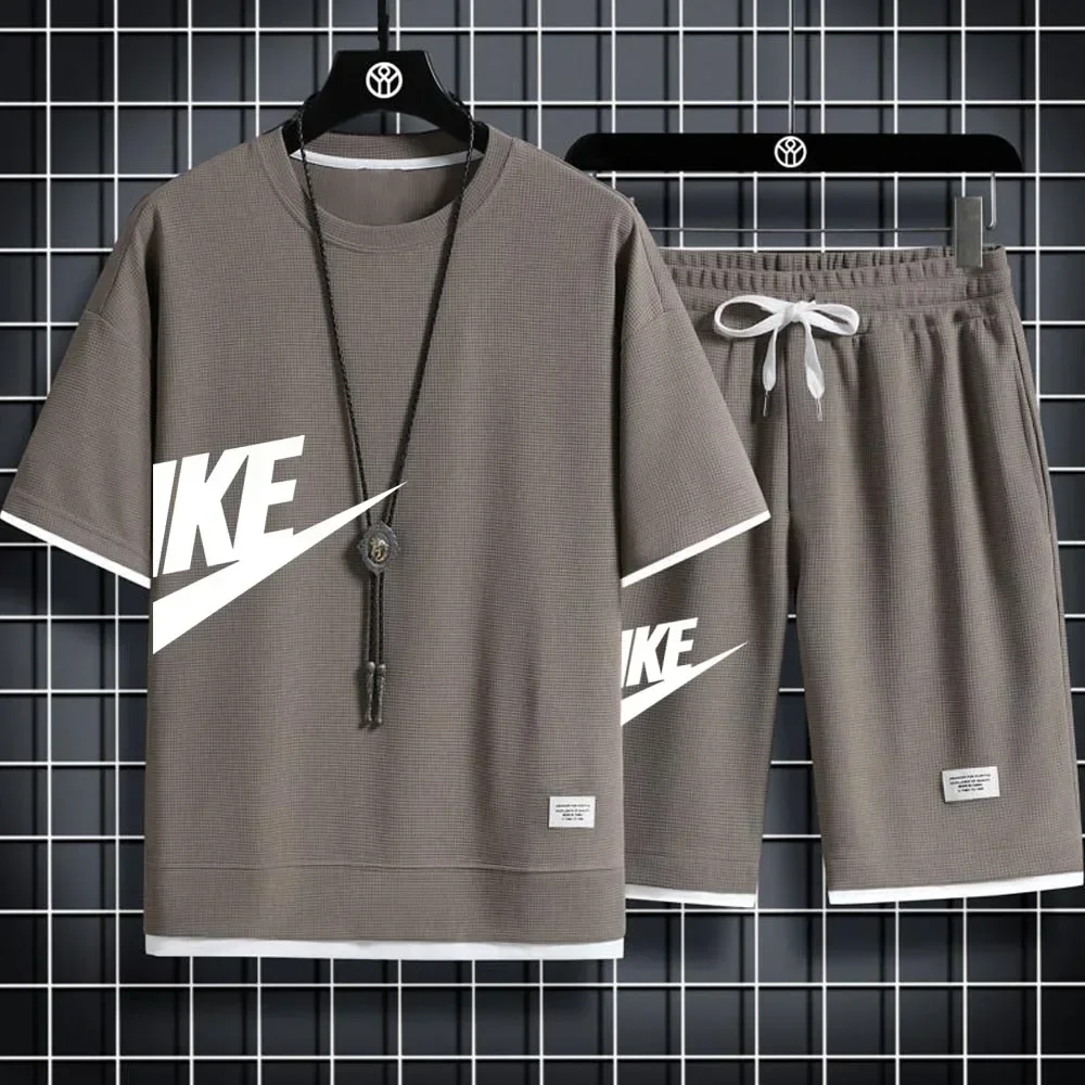 2025 Men's casual two-piece tracksuit Short sleeve and pants Summer Sports Fitness Jogging men's waffle suit fake two pieces