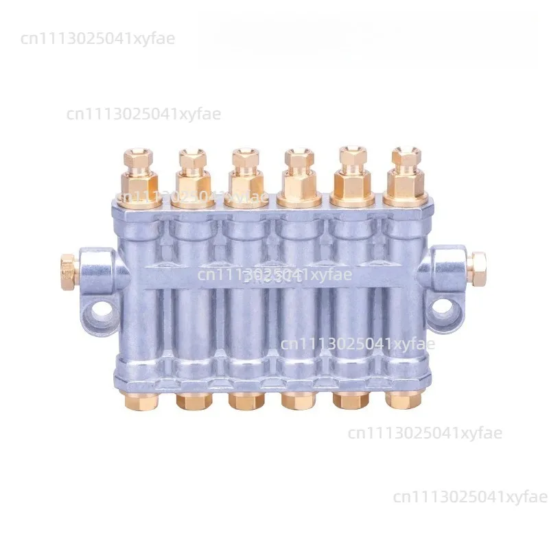 Quantitative volumetric oil distributor