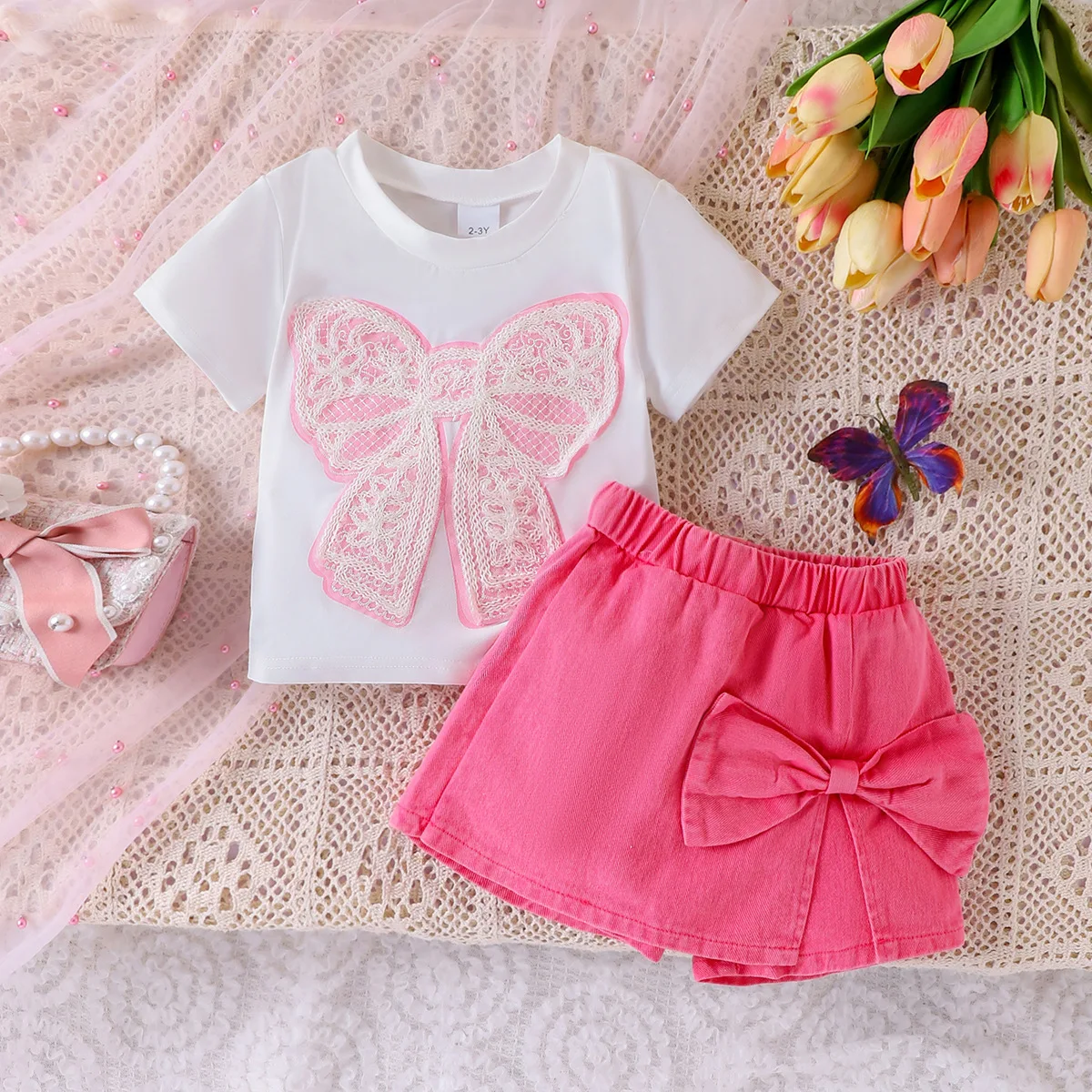 

Europe and the United States summer trend cute girls set of small children bow patch short-sleeved T-shirt + trouser skirt