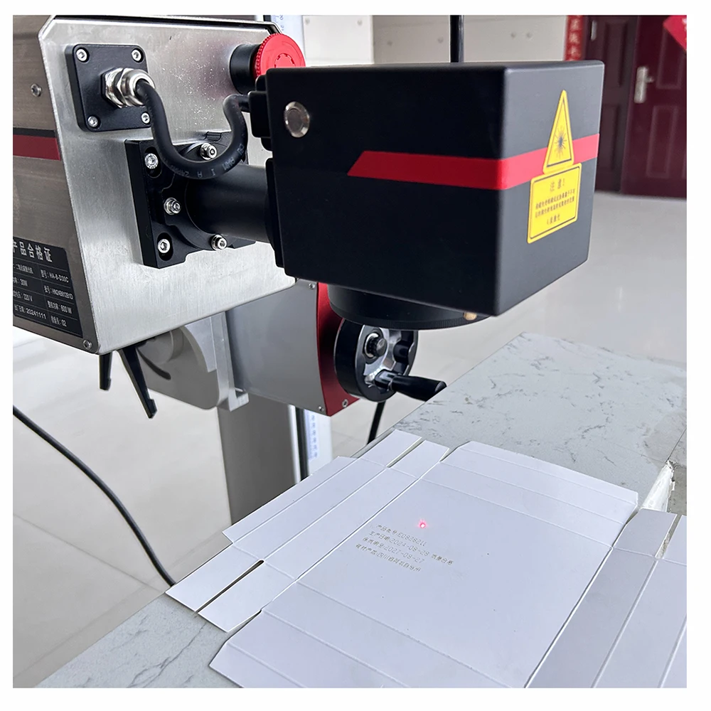 Auto Online Flying Co2 Laser Marking Machine Expiry Date Batch Code Laser Printer for Plastic Bags Cable Wire Pet Bottle
