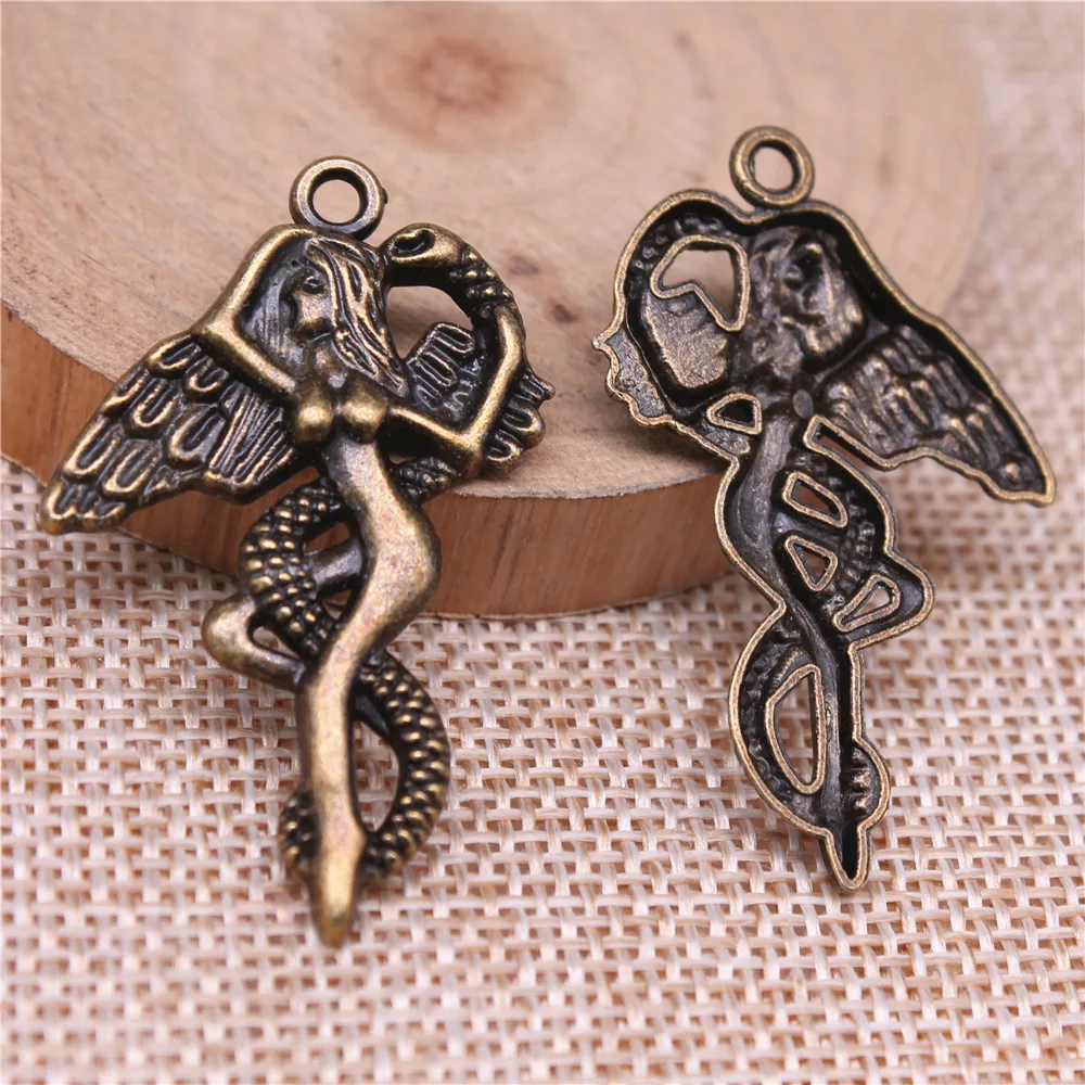 

20 шт., 40x26 мм (1,57x1,02 дюйма), 2 цвета: античная бронза, античное серебро, подвески-талисманы в виде Евы и змеи.