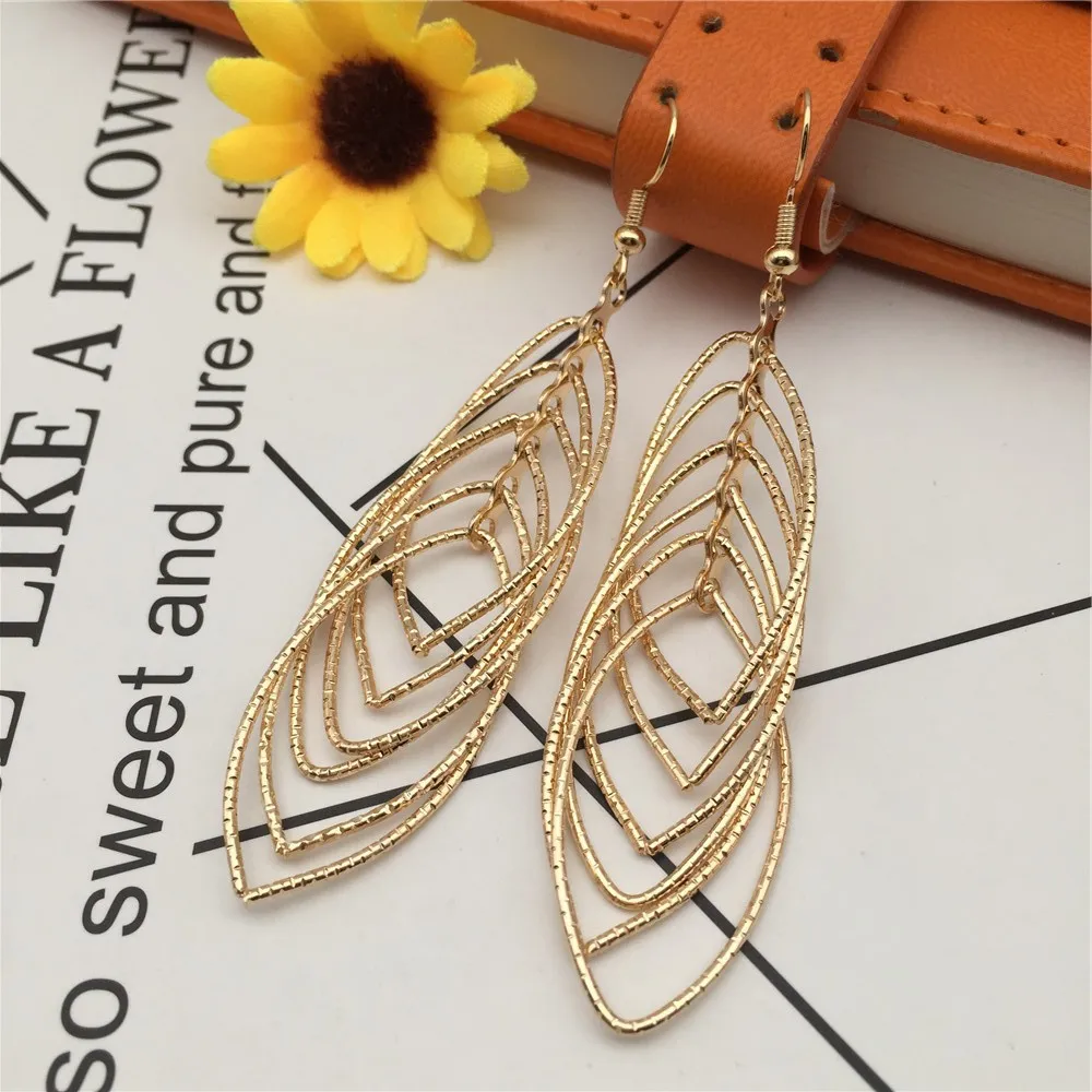 

High-End 925 Sterling Silver Hypoallergenic Teardrop Hollow Prism Statement Earrings