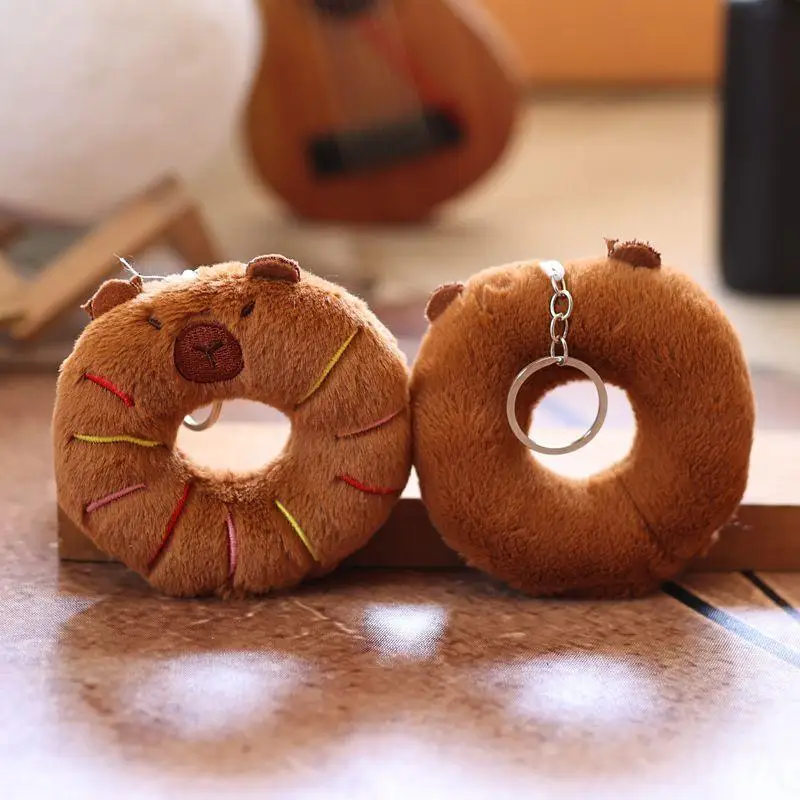 1 ชิ้น Creative Donut ตกแต่งอาหารตุ๊กตาพวงกุญแจการ์ตูน Capybara จี้ Soft Plush ตุ๊กตากระเป๋าอุปกรณ์เสริม
