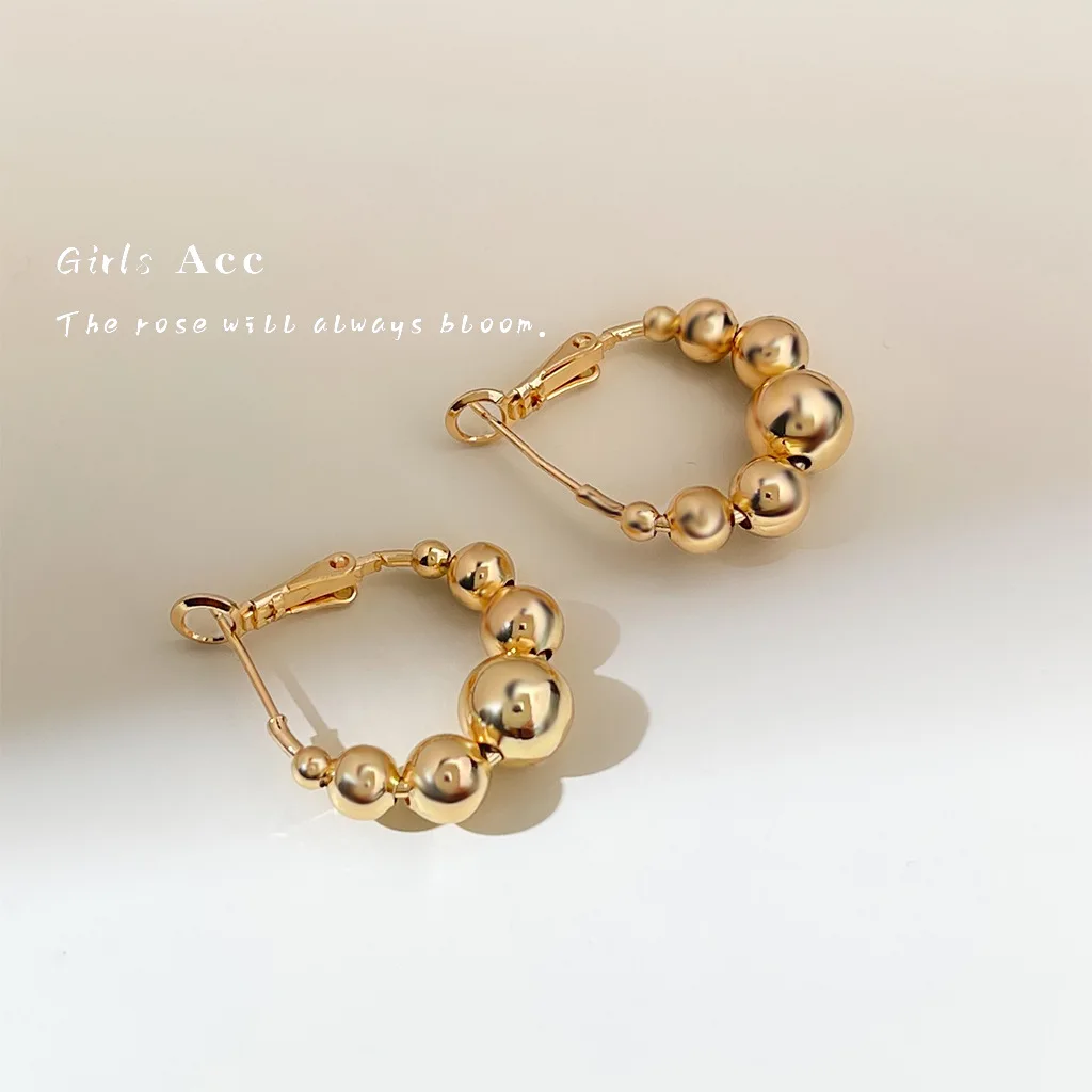 

Old Money Style Hollow Gold Ball Bean Earrings Exaggerated Fashion Hoop Unique Design Daily Wear Luxury Cross Border Ear Jewelry