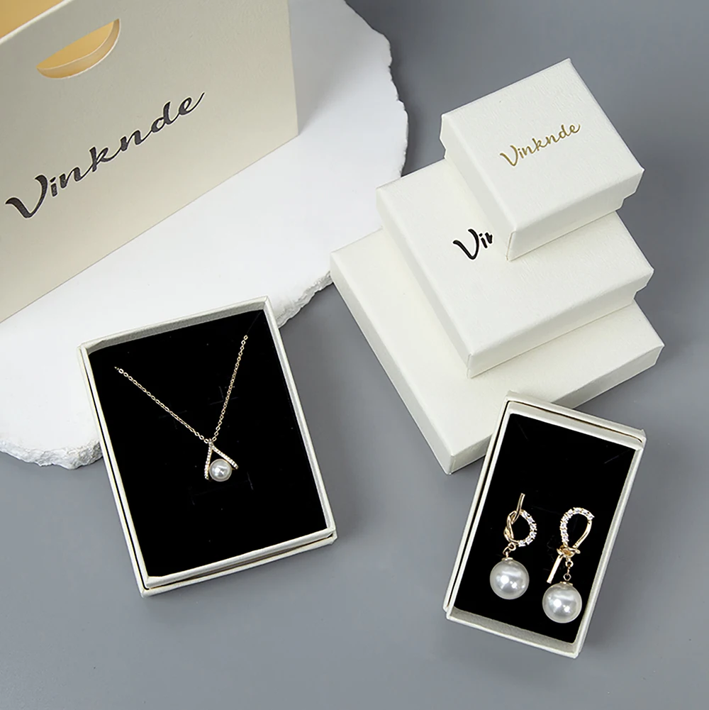 

Custom Logo Beige Kraft Cardboard Paper Jewelry Gift Box for Necklace Ring Earring with Foam Insert for Multi-Piece Jewelry Sets