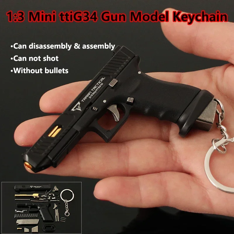 

1PC Mini Gun Pendant 1:3 Nylon Hand Grab Half Alloy TTIG34 Pistol Model Metal Keychain