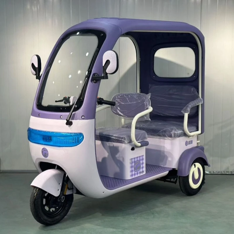 

Electric tricycle with shed to pick up and drop off children Double-row passenger and cargo dual-purpose battery car Leisure