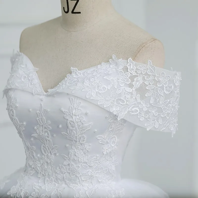 Abito da sposa con applicazioni con spalle scoperte Plus Size Treno lungo Perle Abito da sposa Tulle Mariage Vestido De Noiva 2024 Personalizzato