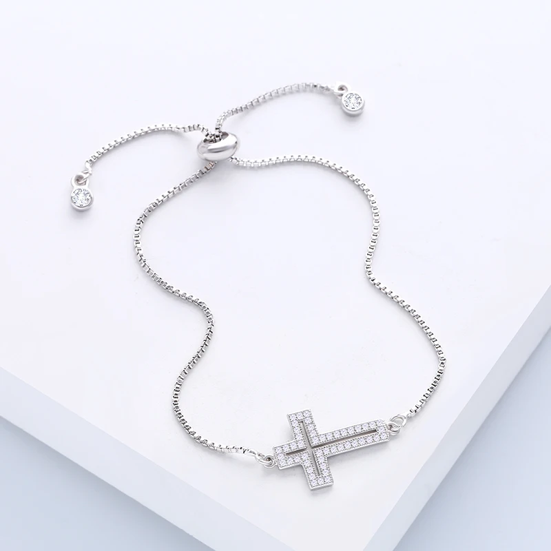 FLOLA New Cubic Zirconia Sideways Jesus Cross Bracelet Women Adjustable Gold Plated Bracelet with Cross Religious Jewelry brta17
