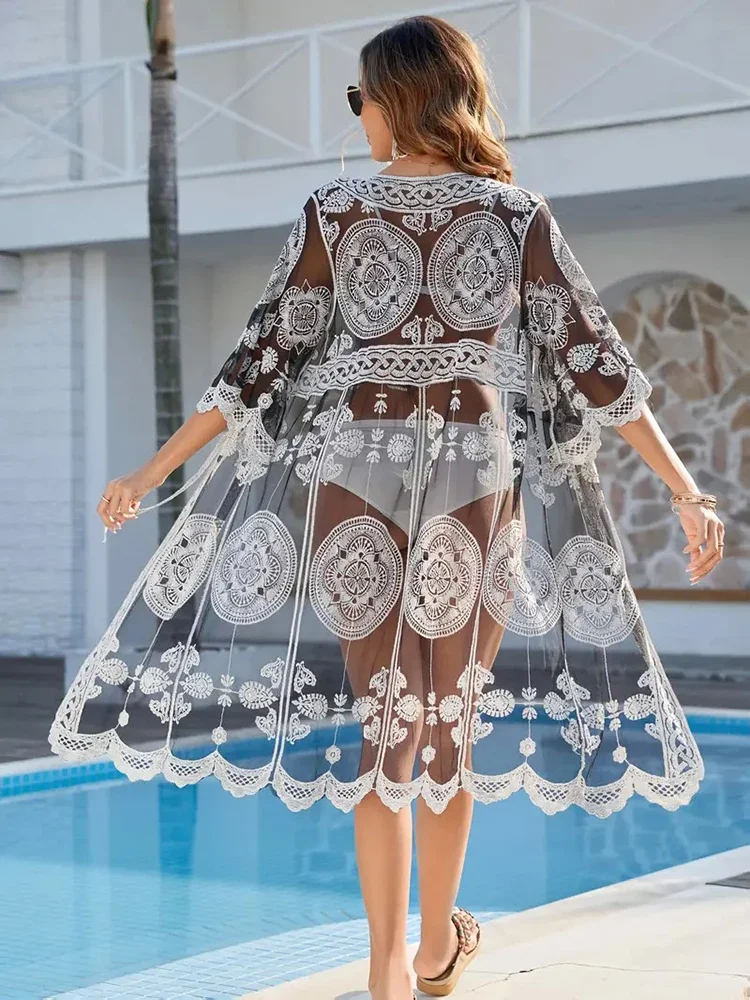 新しいレースビキニカバーアップ女性ビーチカバーアップシースルー刺繍夏の新ファッション女性のクラシックオープンステッチビーチウェア