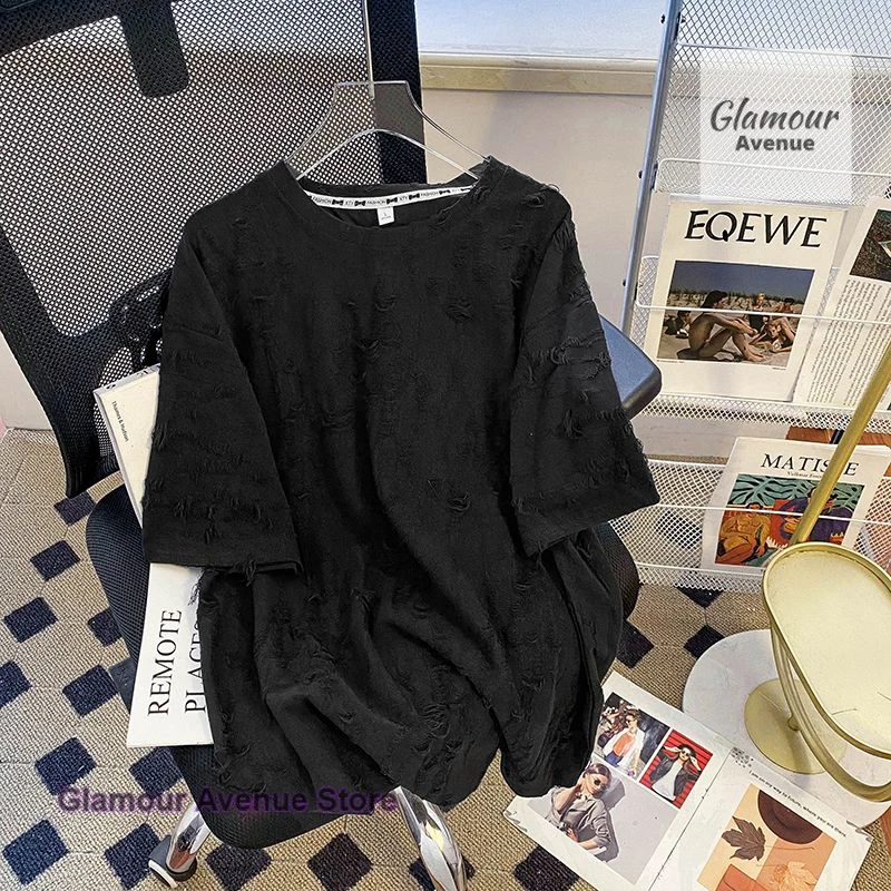 

French style fashion hollow hole design sense short sleeve T-shirt women's summer dress new niche plus size casual Joker top.