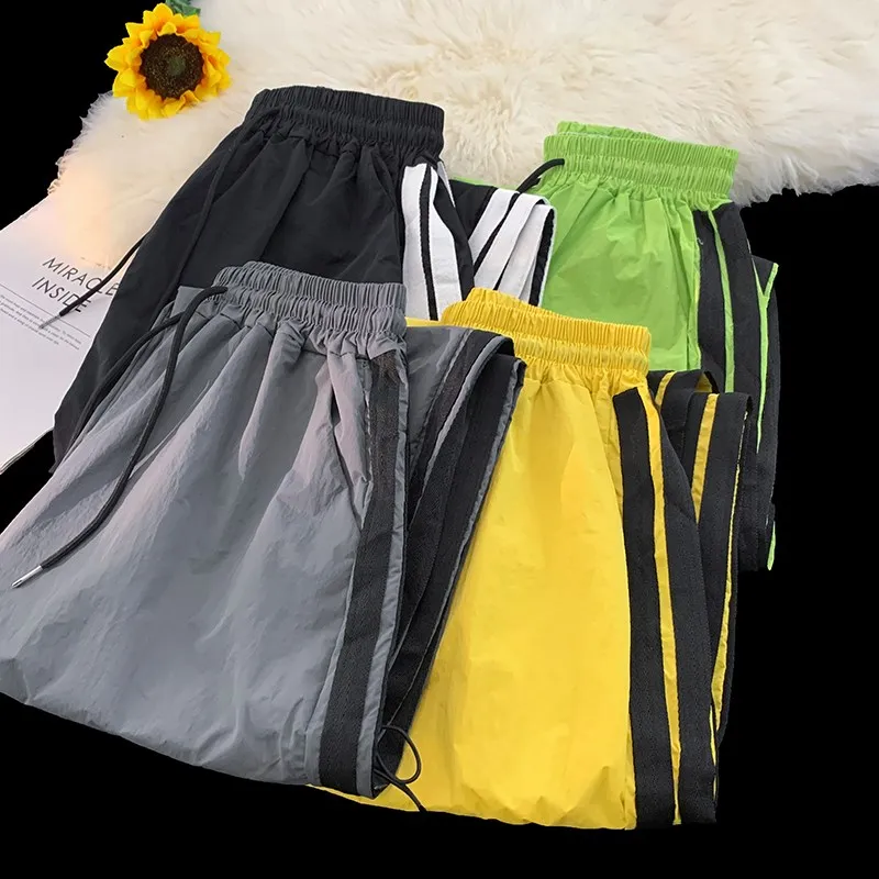 

Мужские спортивные брюки в стиле ретро с цветными полосками, свободные, широкие штанины, быстросохнущие, в стиле хип-хоп, драпированные