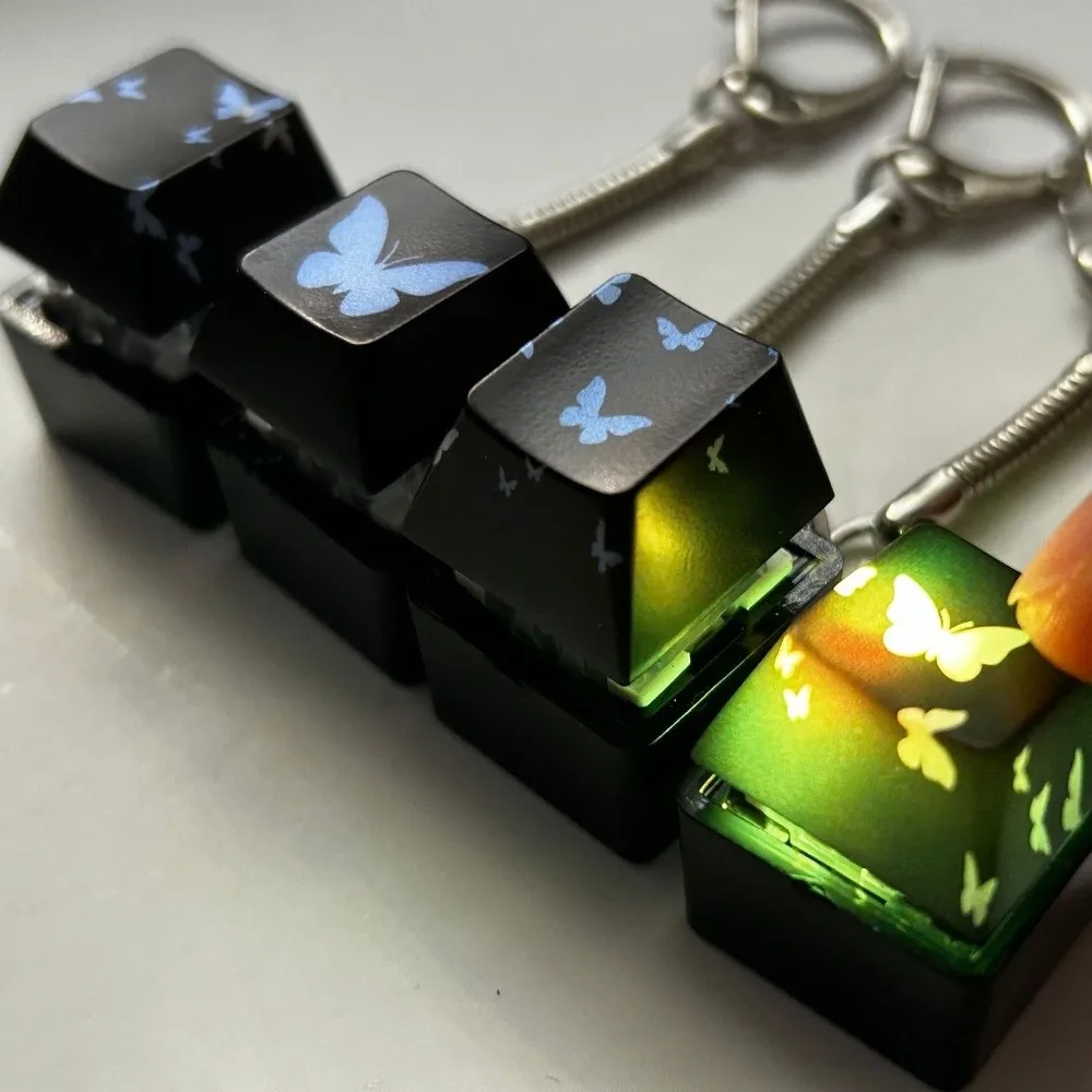 Decompressione 4 tasti Pulsante Keycap Portachiavi Tappi tastiera Pulsante brillante Keycap Passa il tempo Sollievo dallo stress Clicker Giocattolo Regalo