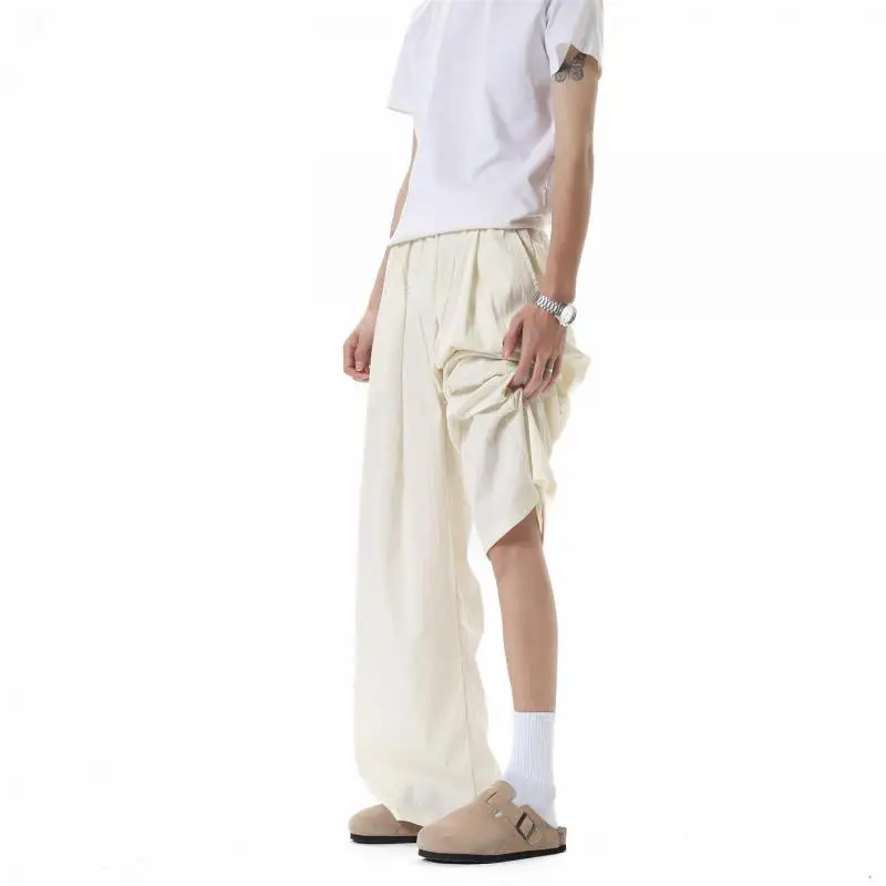 

​ ​ Минималистичные мужские брюки с драпировкой, широкие брюки с эластичной резинкой на талии, элегантные струящиеся брюки для отдыха для минималистской мужской одежды 5XL