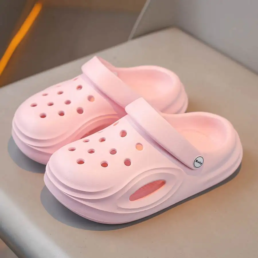 A pair of new summer girls soft bottom hole shoes boys home bathroom slippers children beach shoes