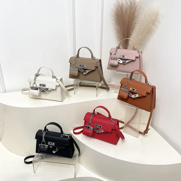 

2025 autumn new 2273 lock average size PU sewing line oblique span handbag trendy small square bag women's bag