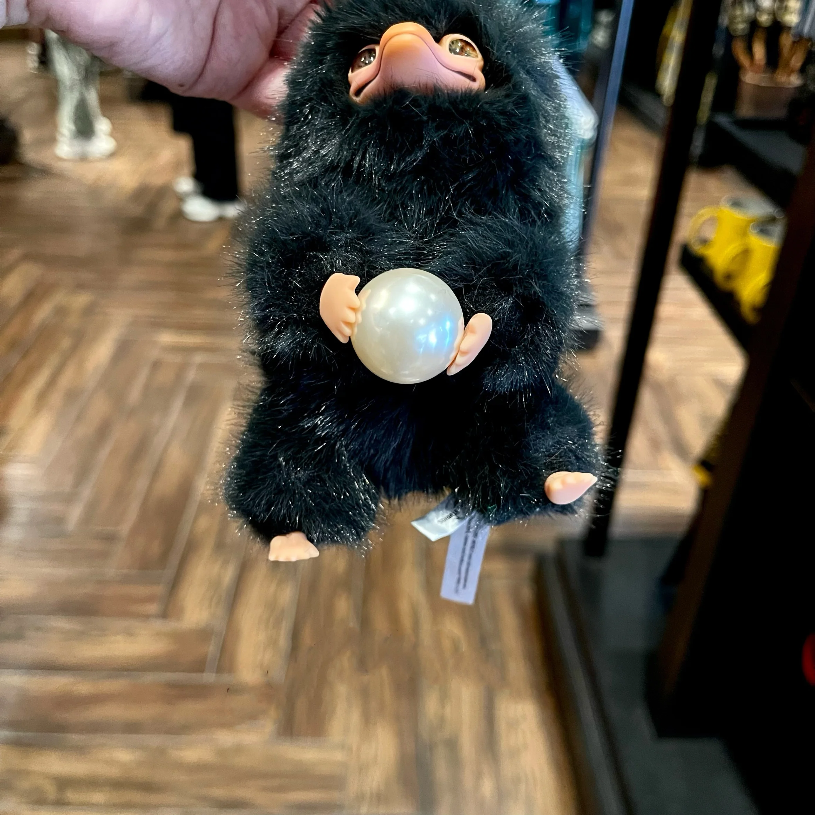 Universal Beijing Resort's Magic Academy Pet - Black Niffler Holding a Ball Plush Keychain, Backpack Ornament, Gift & Souvenir