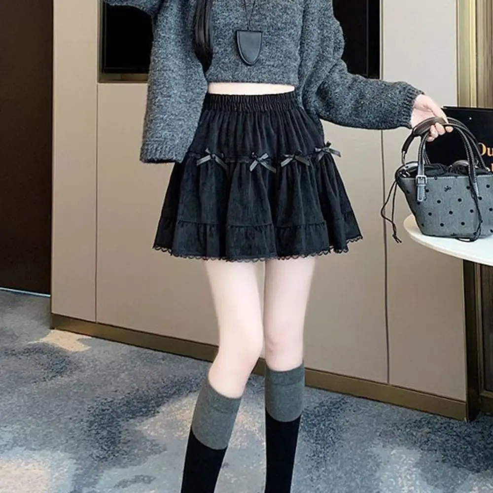 Minigonna corta da ragazza a vita alta con pantaloni di sicurezza Gonna a trapezio con fiocco con volant Abito da torta Minigonne a pieghe in pizzo allentato Lady