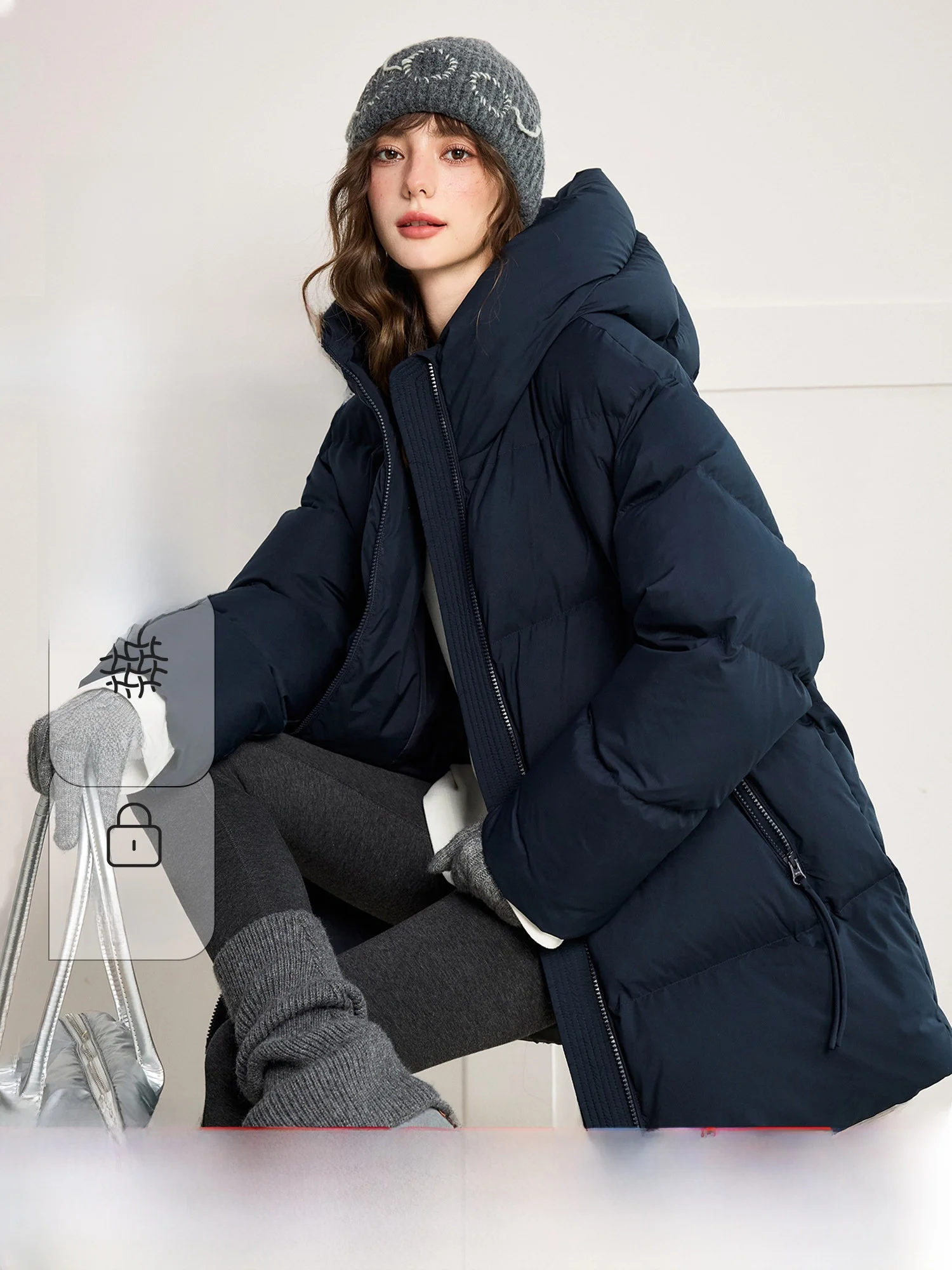 

Женский пуховик-жилет из полиэстера с наполнителем из гусиного пуха (90% пуха)