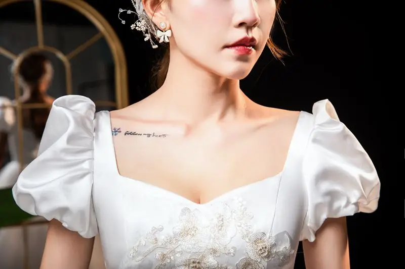 XXN-184 # Trouwjurk baljurk 2025, nieuwe bruids Franse paleisstijl, goedkope groothandel, kantborduurwerk, champagnekloem uit China