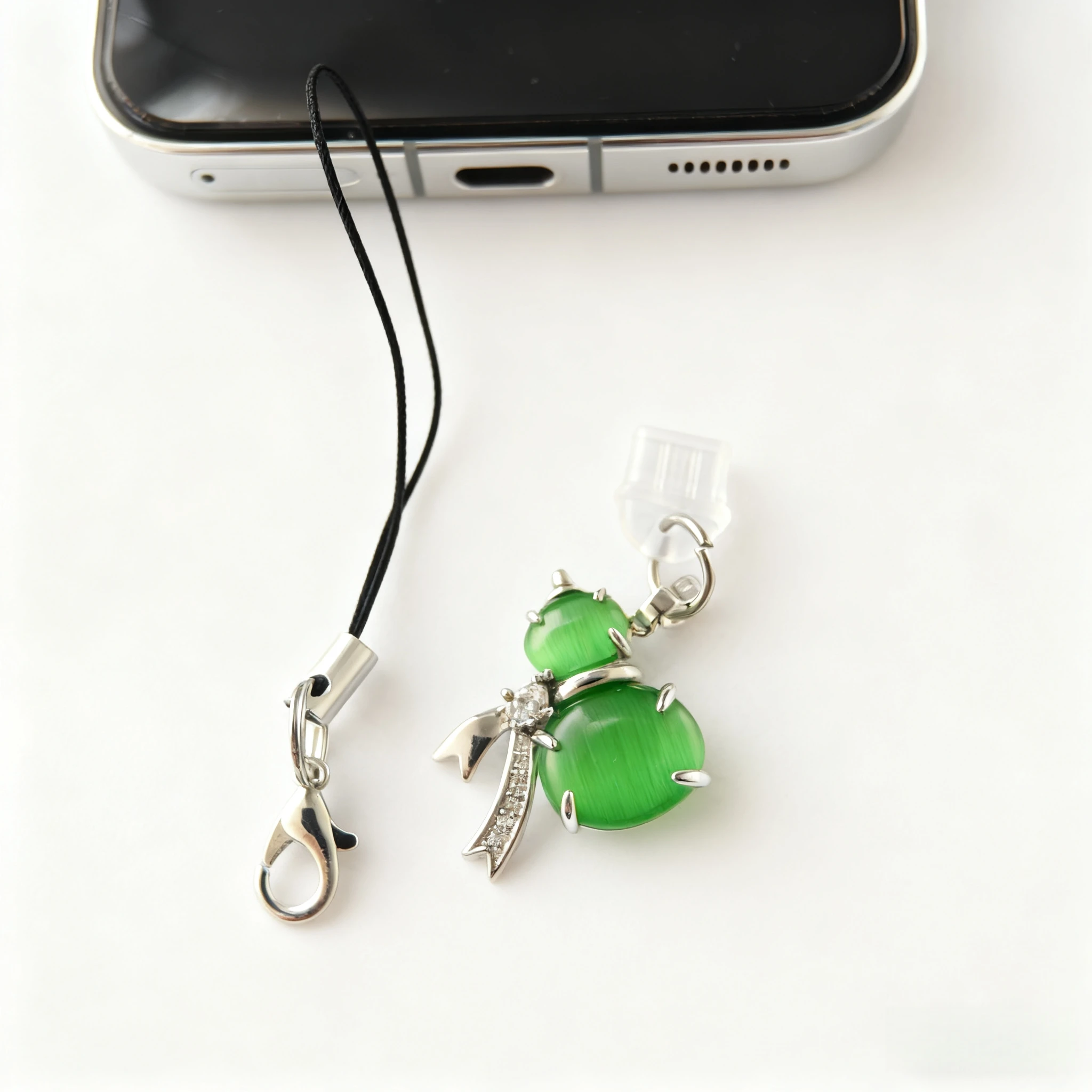 

1 Piece Zirconia Crystal Gourd-Shaped Phone Dust Plug - Cat's Eye Texture with Lanyard Decoration Dustproof Accessory