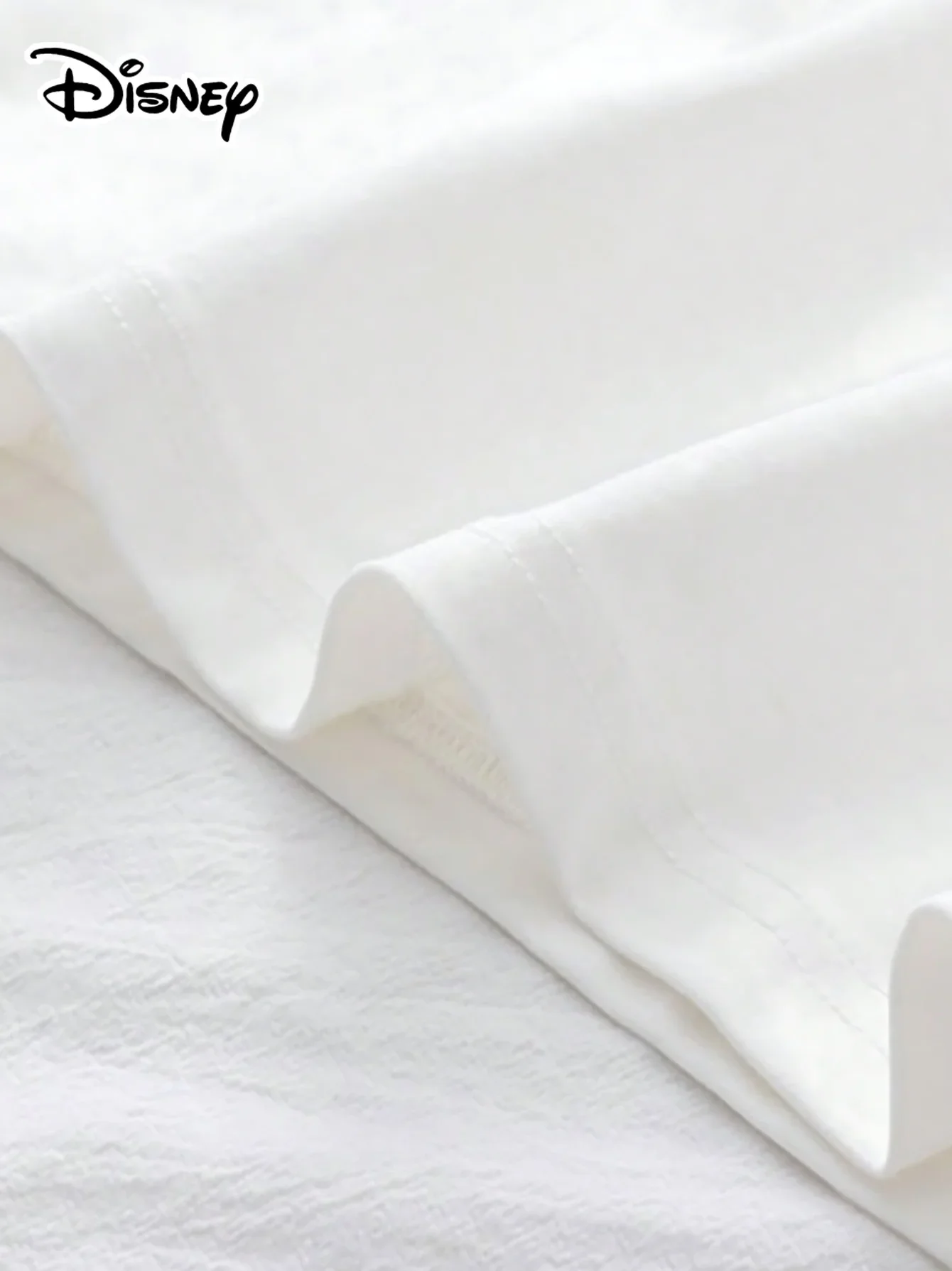 ديزني 2025 جديد حار زوجين العصرية موضة الترفيه القطن الخالص تي شيرت ريترو شارع كلية نمط التنقل Y2k Harajuku للجنسين