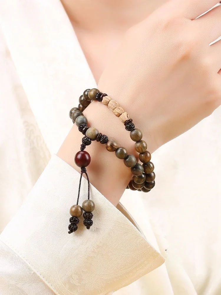 

Natural old material green sandalwood Buddha bead bracelet for men and women sandalwood passion seed hand-made wooden bracelet