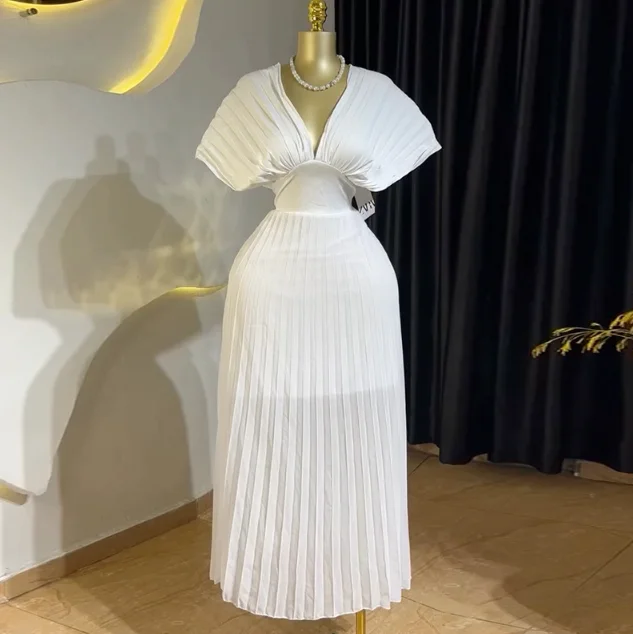 

Women's fashionable and elegant pleated skirt with V-neck bat sleeves and high waist A-line skirt, summer 2025 new style