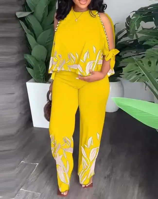 قطعتين مجموعات ملابس النساء 2025 الصيف موضة النباتات طباعة سبليت كم بلوزات مستديرة العنق و عادية مستقيم الساق فستان أطفال مع سروال داخلي الشارع الشهير