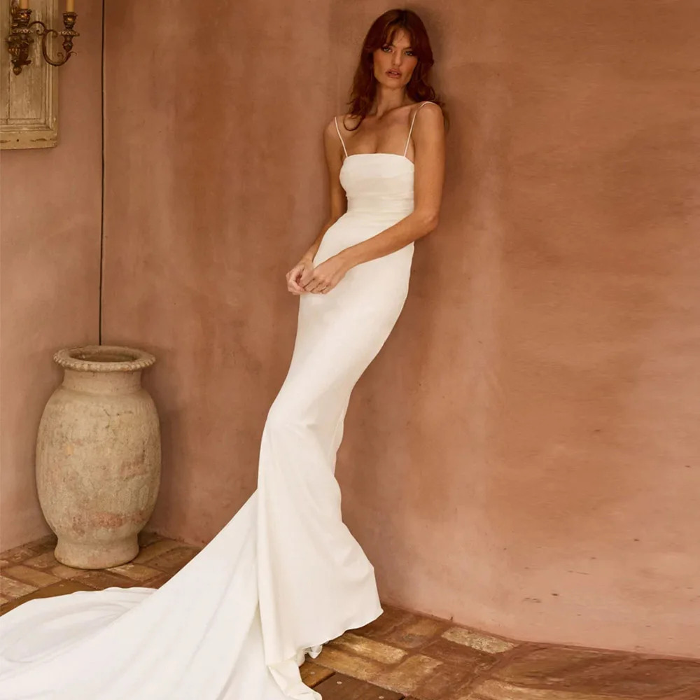 Suknia ślubna syrena w nowoczesnym stylu na zamówienie 2025, elegancka, na ramiączkach spaghetti, z kokardą i guzikami, seksowna suknia dla panny młodej.